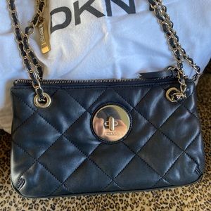DKNY black quilted leather handbag.